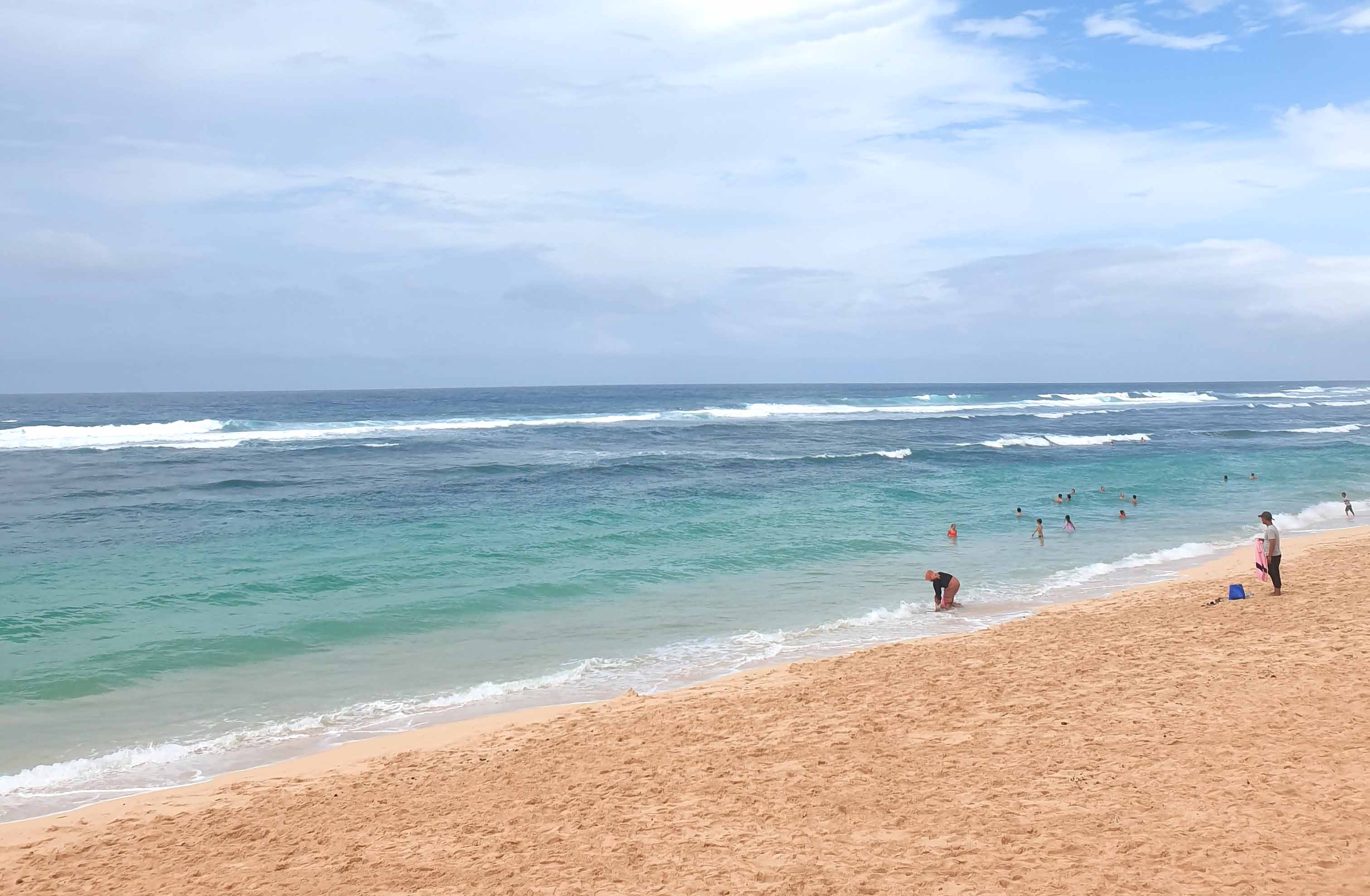 melasti beach visitors.jpg